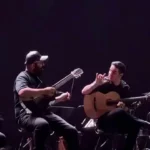 واکنش محسن یگانه از پاره شدنِ سیم گیتار وسط کنسرت واکنش محسن یگانه از پاره شدنِ سیم گیتار وسط کنسرت