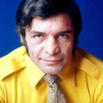 (عکس) بیک ایمانوردی در حال تمرین با هالتر در خانه، دهه ۴۰